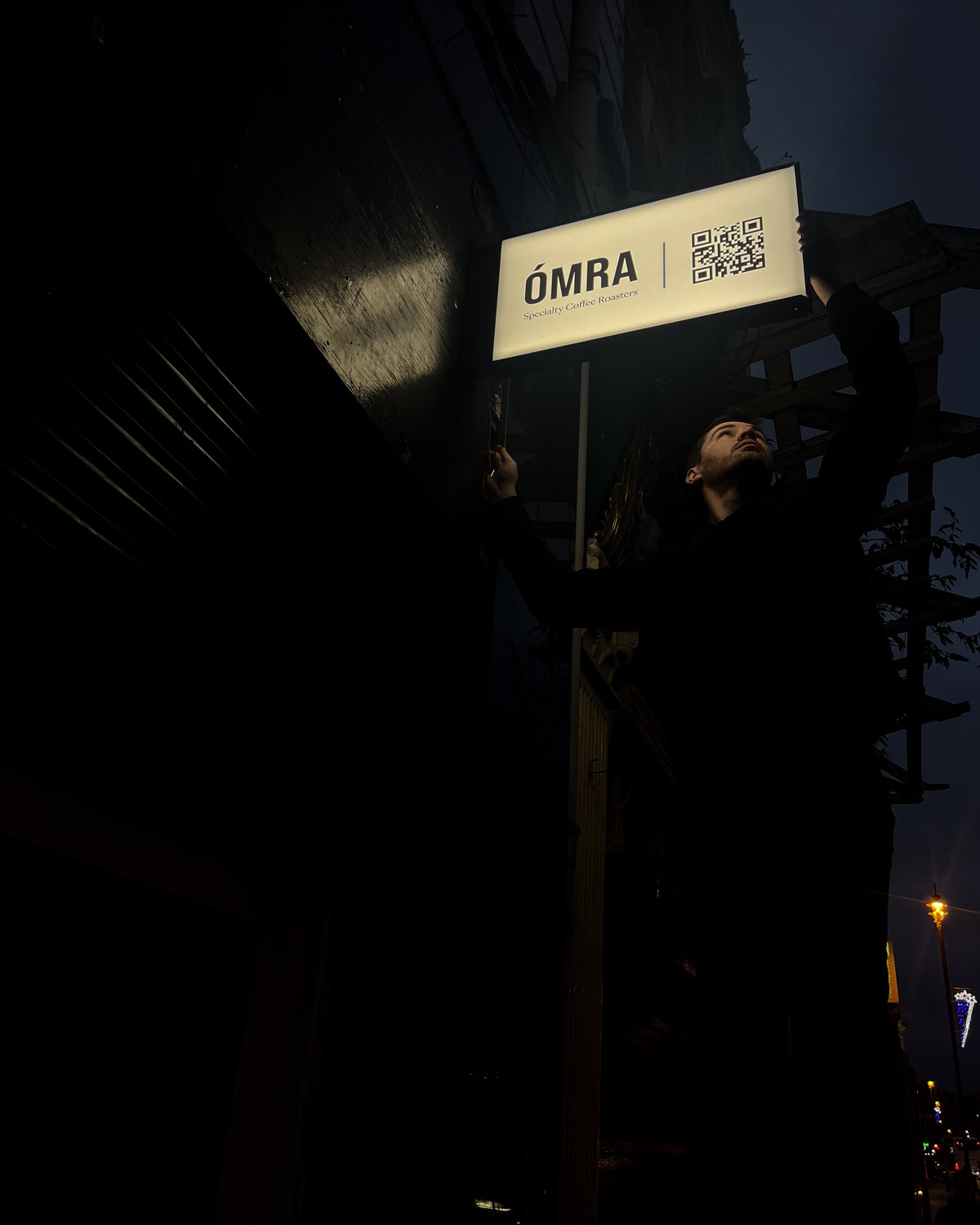 Ómra Coffee sign at 25 Strand Road in Derry