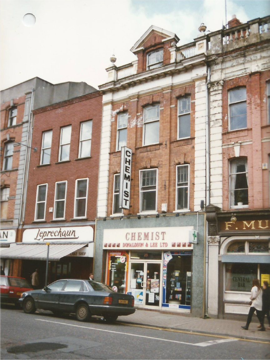 A historic image of 25 Strand Road in Derry, showcasing the original design of the Ómra cafe