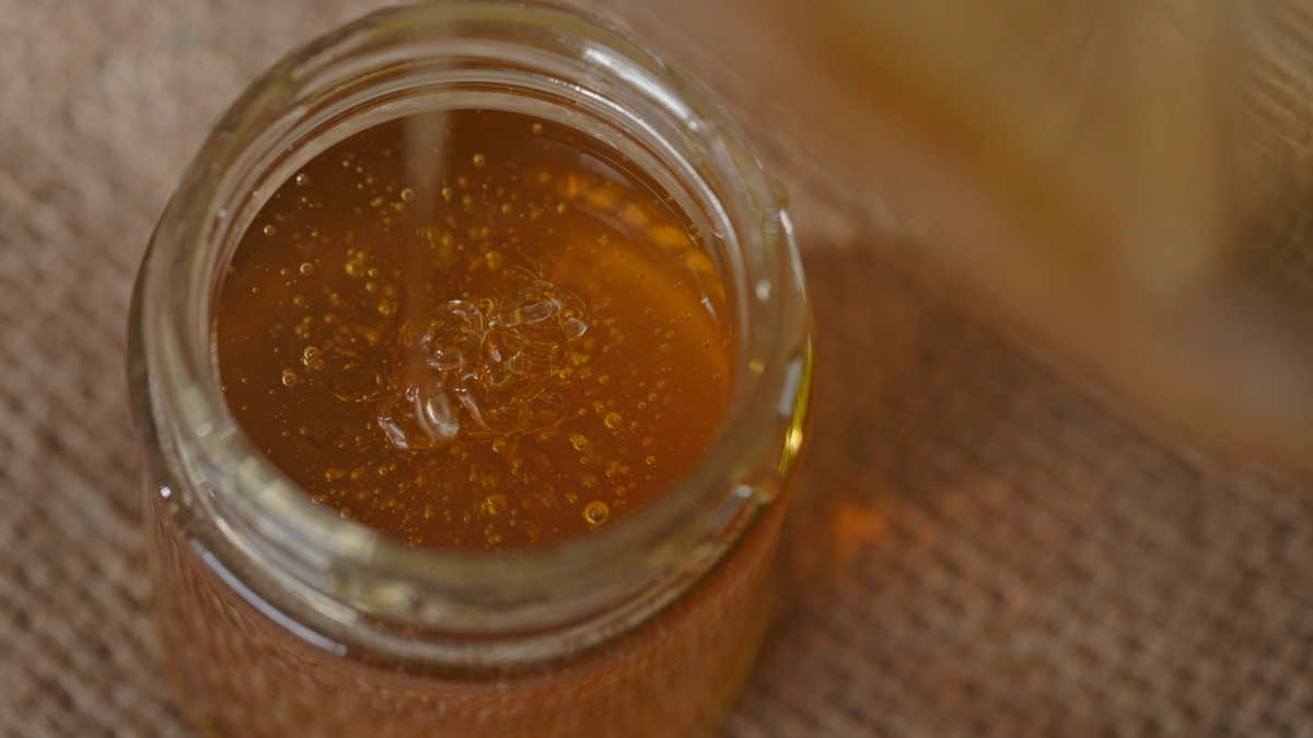A jar of amber honey.